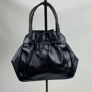 Vintage Black patent Leather Handbag Gold accent and clasp center opening